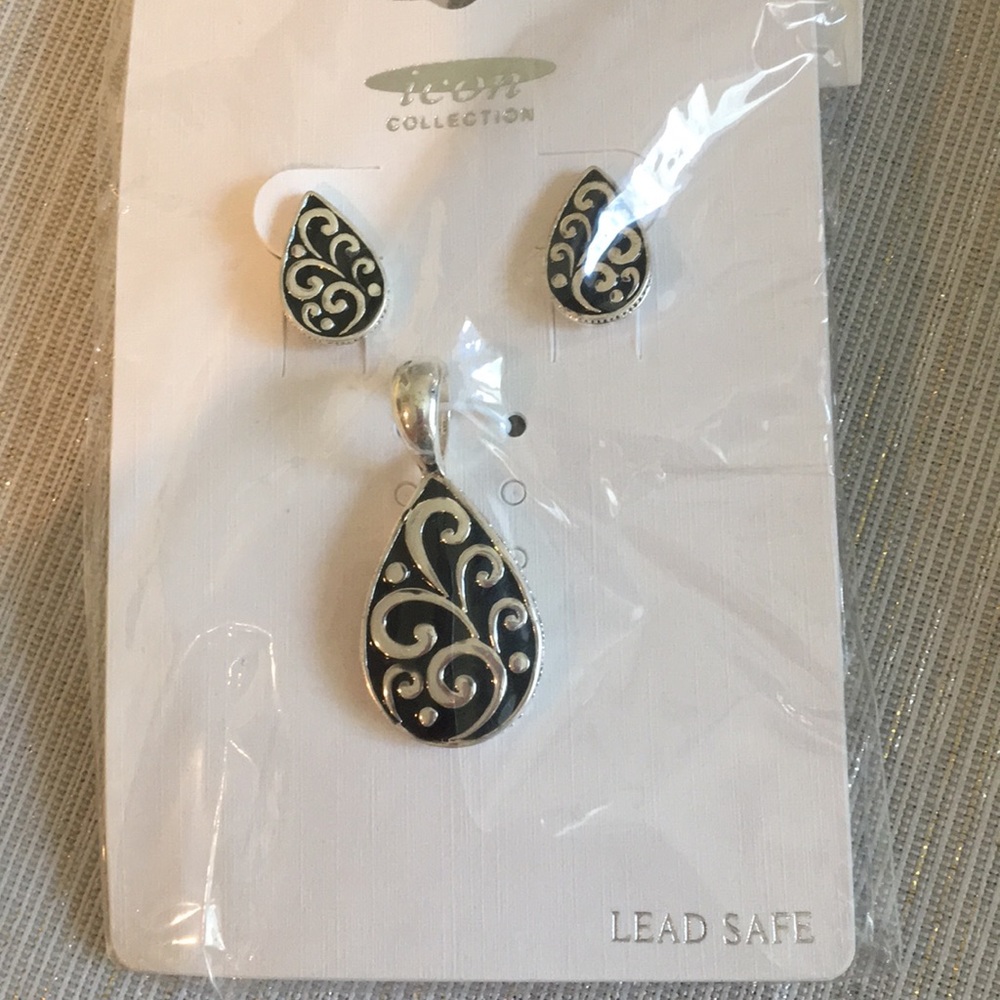Silver earrings and pendant